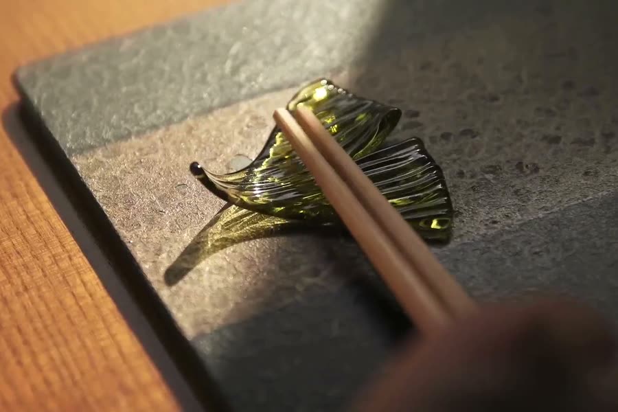 Chopsticks on a stone plate