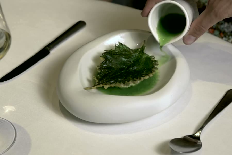 Green sauce being poured